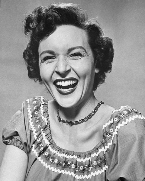 Facial expression, Smile, Eyebrow, Retro style, Hairstyle, Chin, Portrait, Vintage clothing, Monochrome, Laugh,