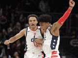 Washington Wizards&#39; Jerome Robinson, left, celebrates with Rui Hachimura after making a 3-point shot during the fourth quarter of the team&#39;s NBA basketball game against the Brooklyn Nets, Wednesday, Feb. 26, 2020, in Washington. The Wizards won 110-106. (AP Photo/Luis M. Alvarez)