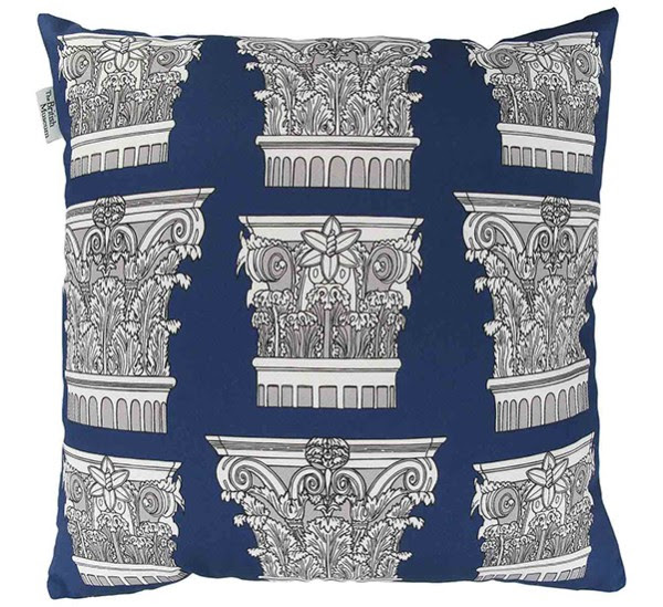 A blue cushion decorated with Roman architectural features.