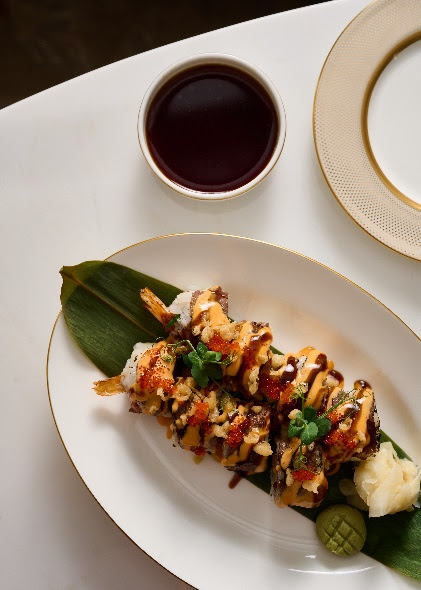 A plate of food on a tableDescription automatically generated