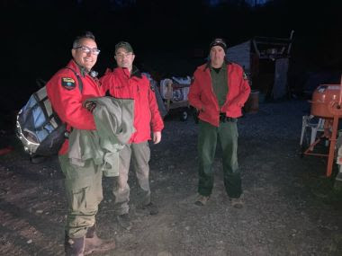 Three Rangers posing for photo after successful search and rescue