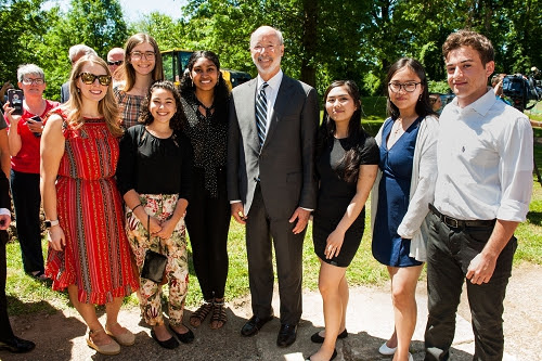 Ms. Ashley Zesserman, Governor Tom Wolf, and 278th class recent graduates 