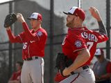 Washington Nationals pitchers Stephen Strasburg, right, and Patrick Corbin throw bullpen sessions during spring training baseball practice Friday, Feb. 14, 2020, in West Palm Beach, Fla. (AP Photo/Jeff Roberson) **FILE**
