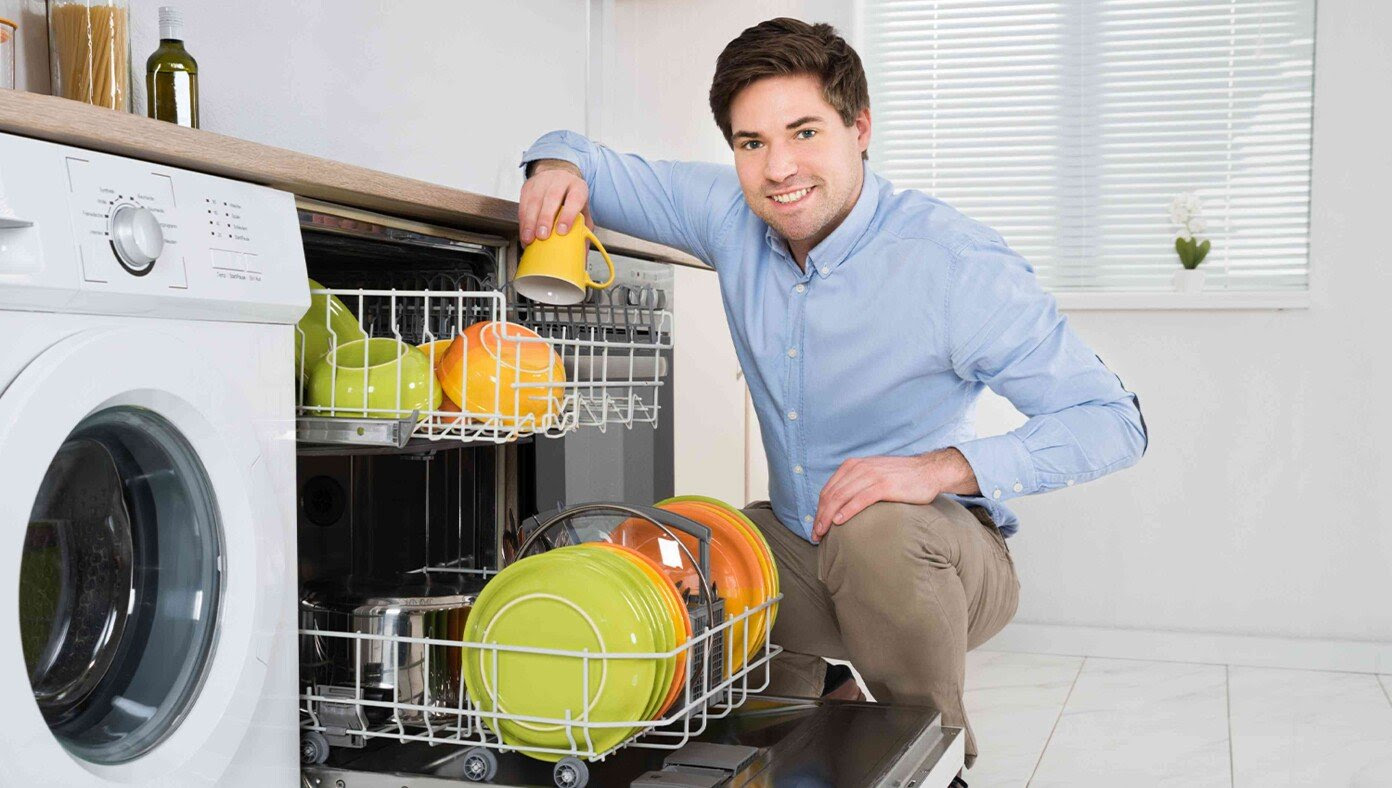 Dad Empties Dishwasher So He Has An Excuse To Watch 19 Hours Of Football This Weekend