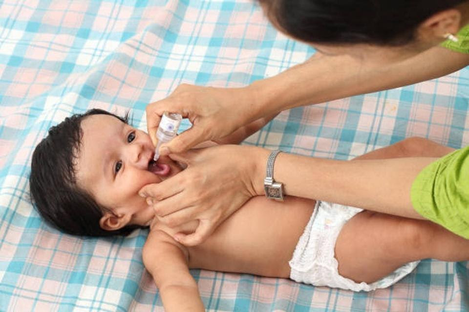 Infant Receiving Oral Polio Vaccine