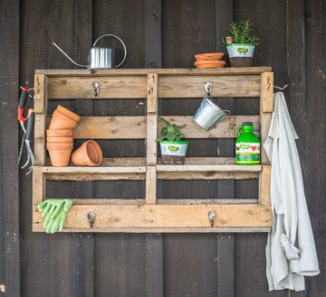DIY garden tool rack made from pallets