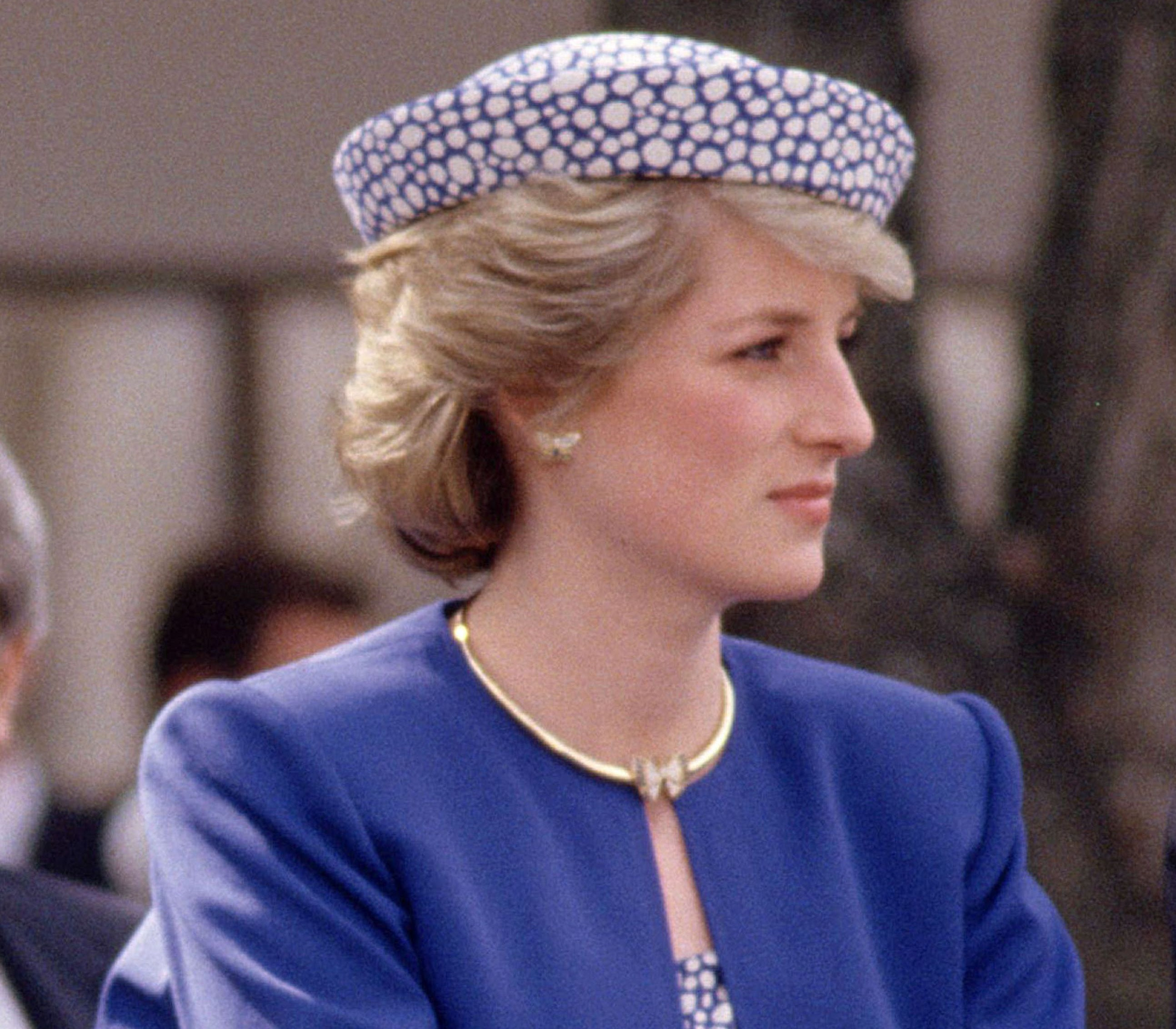 The late princess wore the butterfly stud earrings with a necklace, which hasn't been seen on Meghan or Kate yet