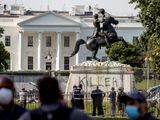 Four men have been charged with damaging and trying to tear down the Andrew Jackson statue in Lafayette Park, which is adjacent to the White House. Prosecutors said all four men were caught on video using straps to try to pull down the statue. (Associated Press)