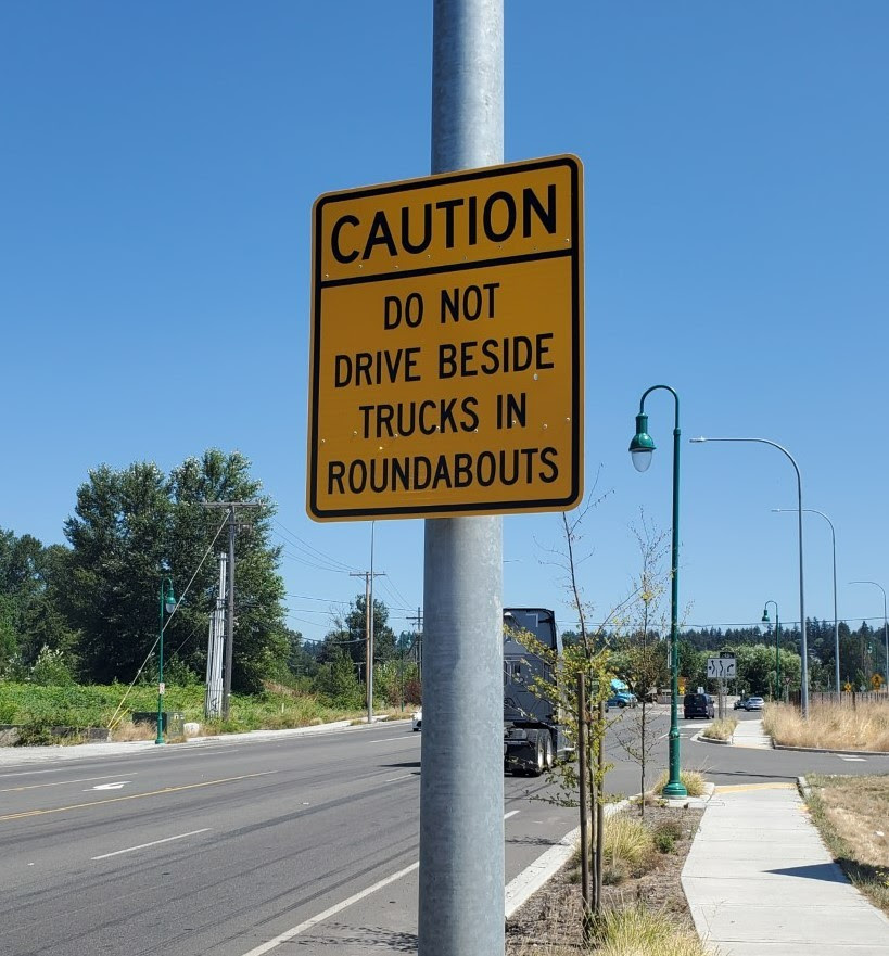 Roundabout Safety Caution Sign