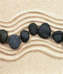 rocks-in-sand-with-ripples