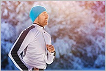 A man jogging during winter.