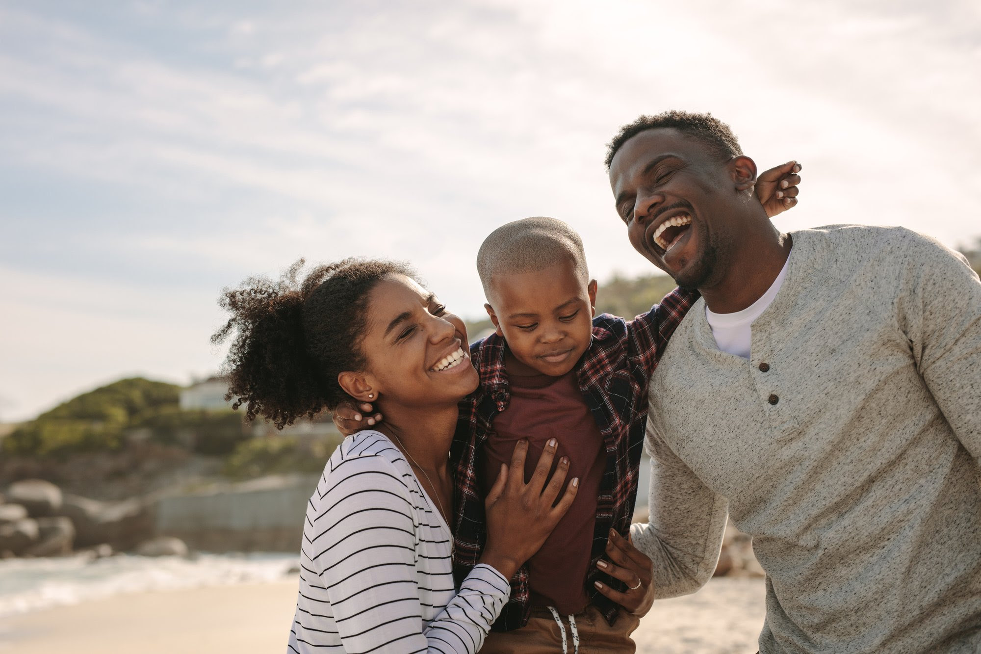 A family laughing together. A family laughing together.