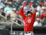 Washington Nationals&#39; Juan Soto reacts after hitting a two-run home run off Miami Marlins pitcher Josh A. Smith during the fourth inning of a spring training baseball game, Tuesday, March 10, 2020, in Jupiter, Fla. (AP Photo/Julio Cortez)