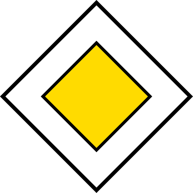 A yellow diamond on a black backgroundDescription automatically generated with medium confidence