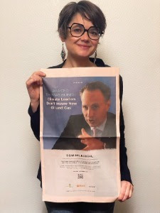 This is our spread in the Financial Times targeting AXA's CEO Thomas Buberl, in the hands of our partner Lucie Pinson, Director of the NGO Reclaim Finance
