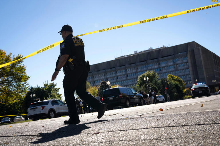 Law-enforcement officers respond to a bomb threat in Washington, DC, on October 27. Drew Angerer/Getty Images