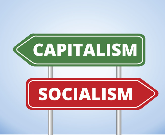 One arrow saying Capitalism and the other saying Socialism pointing in opposite directions