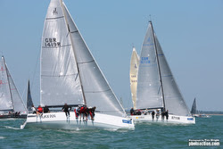 J/111s sailing on Solent off Cowes, England