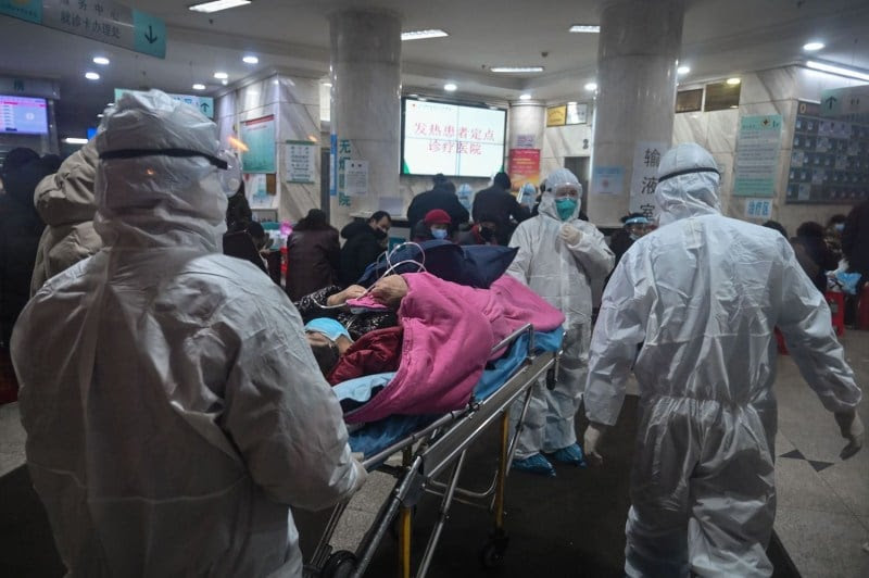 Doctors attend to patients hit by the coronavirus.