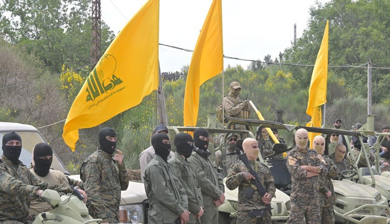 مقاتلون لـ"حزب الله" خلال مناورة عسكرية في جنوب لبنان (نبيل اسماعيل).
