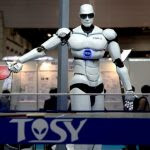 TOPIO ("TOSY Ping Pong Playing Robot") is a bipedal humanoid robot designed to play table tennis against a human being. TOPIO version 3.0 at Tokyo International Robot Exhibition, Nov 2009.
