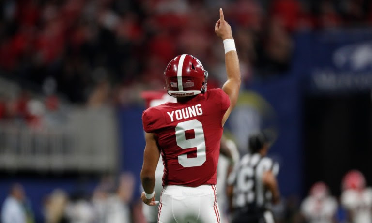 Bryce Young (#9) celebrates touchdown pass for Alabama versus Georgia in 2021 SEC Championship