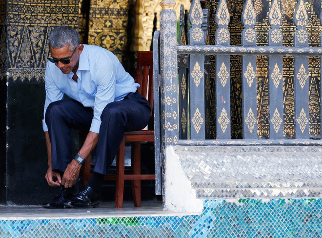 Tổng thống Obama dạo phố, uống nước dừa ở Lào - Ảnh 6. Tổng thống Obama dạo phố, uống nước dừa ở Lào - Ảnh 6.