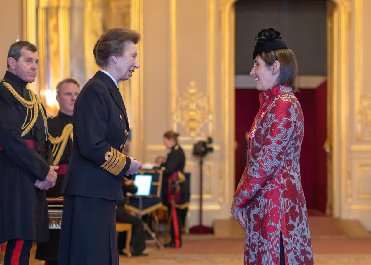 Charlotte receives OBE from Princess Anne