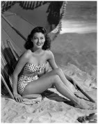 actress-ava-gardner-lounges-on-the-beach-in-a-spotted-bikini-1944