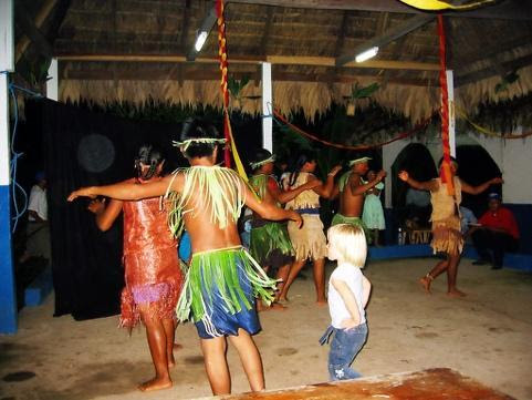 child and adults dancing in Nicaragua