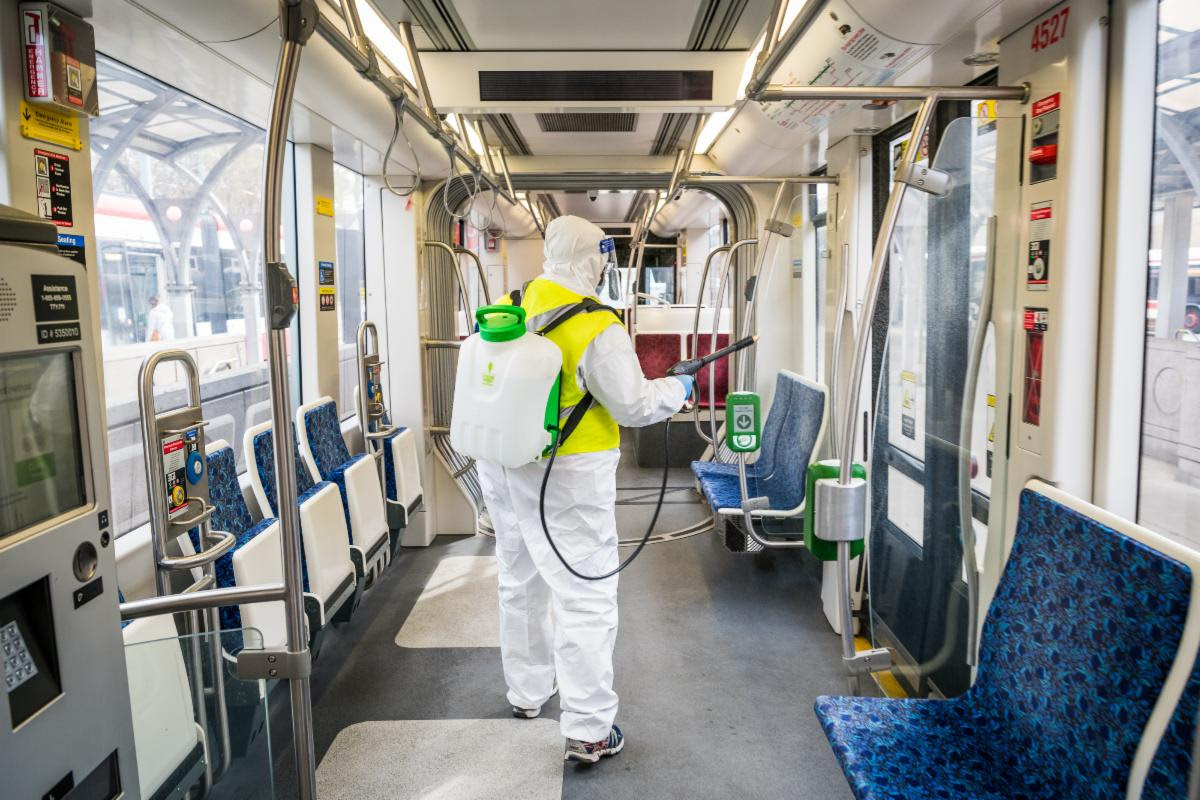 TTC employee disinfects streetcar