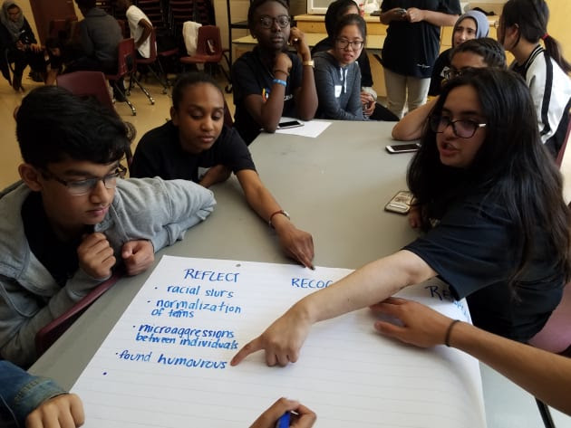 Students from Maple High School in the York Region District School Board plan ways to make their school...