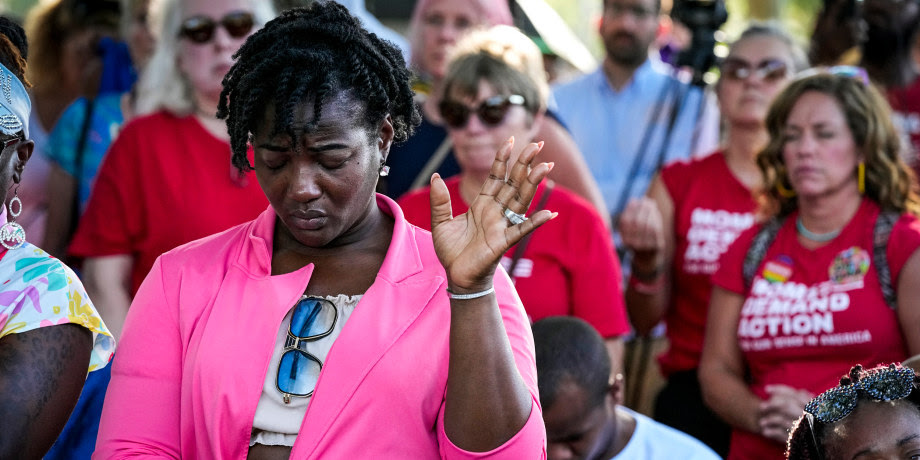 The victims of a racially motivated shooting were remembered at a vigil in Jacksonville 230828-jacksonville-vigil-ew-623a-a82bf7