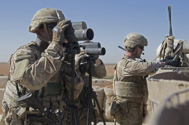 U.S. Army soldiers conduct surveillance during a patrol in Manbij, Syria, in November.