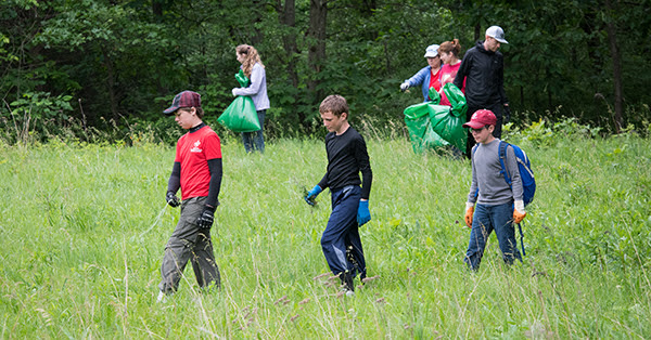 group of stewardship volunteers in field