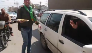 “Palestinians” distribute sweets to celebrate jihad murder of Israeli