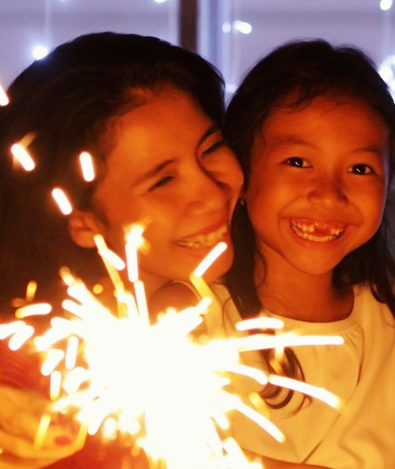 Mother and child with sparkler