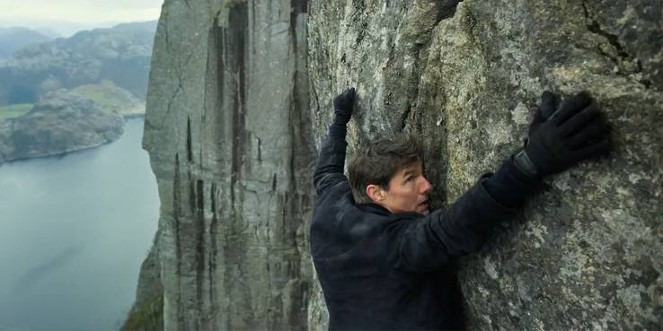 Tom-Cruise-hanging-from-a-cliff-in-Mission-Impossible-Fallout.jpg?q=50&fit=crop&w=738