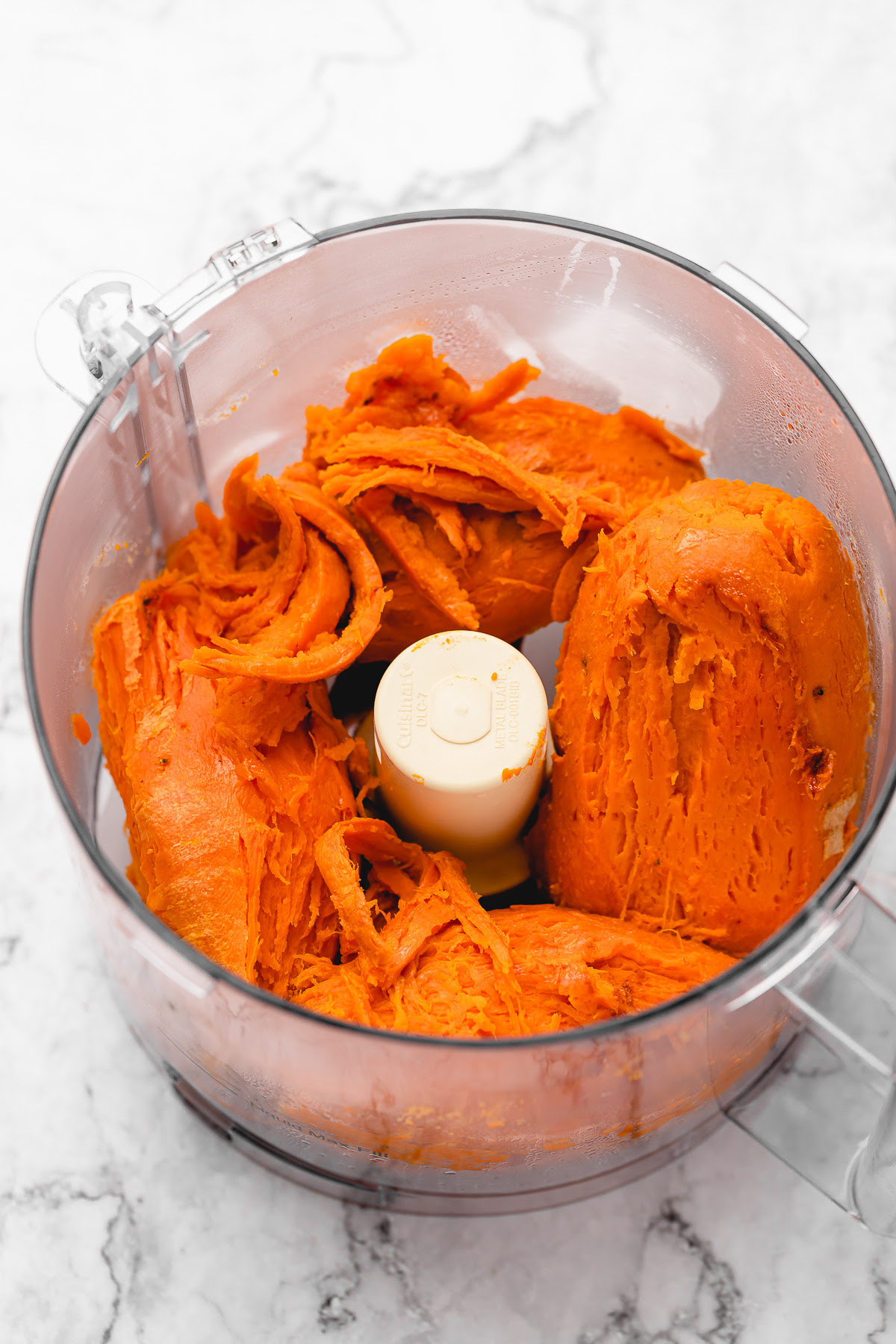 This Vegan Sweet Potato Pie is just like the Southern classic, but made without the dairy and eggs. Sweet, creamy, and perfect! Baked sweet potatoes in food processor