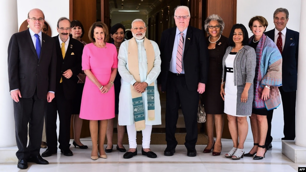 A U.S. congressional delegation, including Reps. Nancy Pelosi, center left, Jim McGovern, left, and Jim Sensenbrenner, center right, pose ahead of a meeting in New Delhi with India's Prime Minister Narendra Modi, center, in this handout photo from the Indian Press Information Bureau, May 11, 2017.