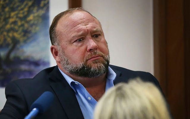 Alex Jones claimed the Sandy Hook massacre was a hoax carried out by actors as part of a plan to increase gun control