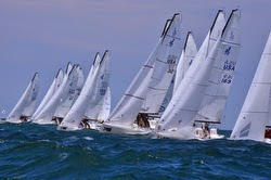 J/70s sailing off starting line
