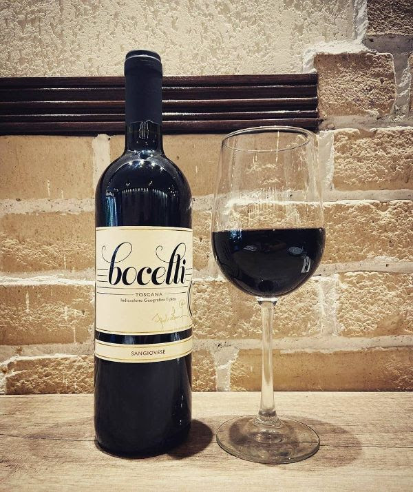 Bottle and glass of Sangiovese IGT Rosso Toscana by Bocelli 2017.