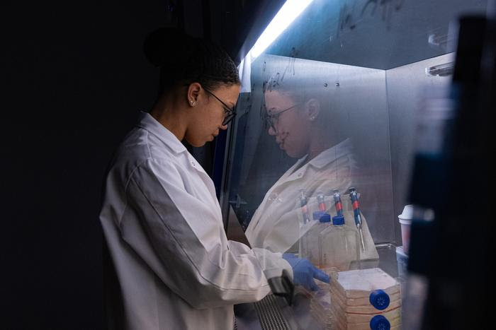 Rice University bionengineer Amanda Nash at work on a new type of cancer treatment described as a "drug factory"