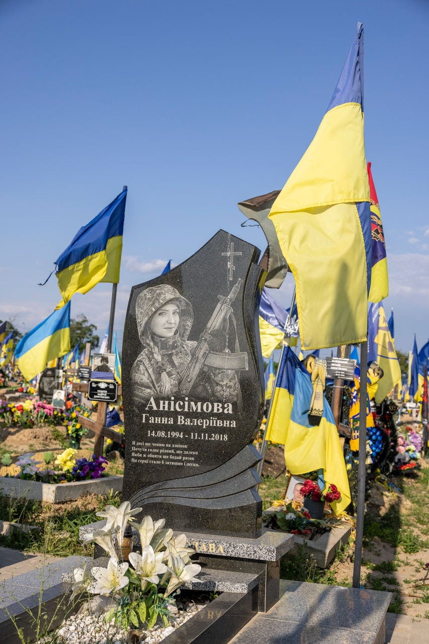 Graves of fallen soldiers at the military section of a cemetery in Kharkiv