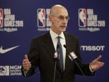 FILE - In this Oct. 8, 2019, file photo, NBA Commissioner Adam Silver speaks at a news conference before an NBA preseason basketball game between the Houston Rockets and the Toronto Raptors in Saitama, near Tokyo. Its been over three months since the commissioners of major sports cancelled or postponed events because of the coronavirus. Enough time for us to grade them on how theyve handled the virus so far. (AP Photo/Jae C. Hong, File)