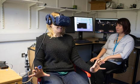 Linda Geddes, left, tries the VR game.