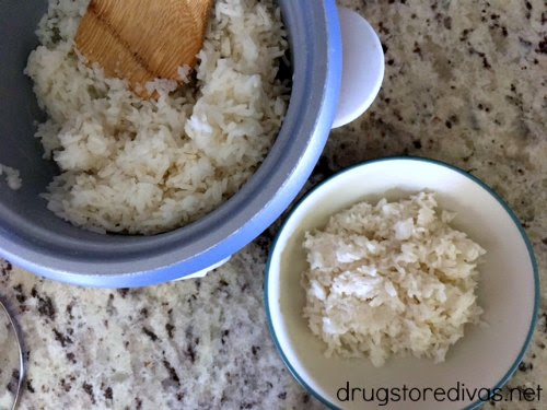 Rice in a bowl next to rice in a  rice cooker.