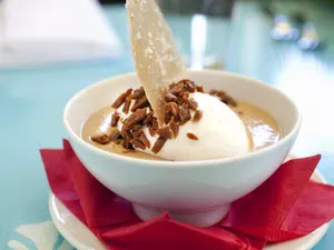 Butterscotch pudding with Vegan Whipped Cream in bowl