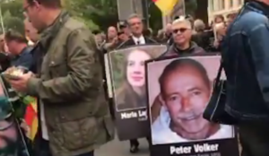 Video: Germans demonstrate with photos of people murdered by Muslim migrants